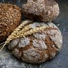 Cum se făcea pâinea pe vremea dacilor. Expoziția care dezvăluie povestea unuia dintre cele mai importante alimente din lumea antică