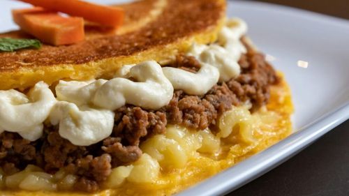 Turte de mălai, umplute cu brânză sau orice altceva/ Ca și tacos sau quesadilla, cachapas venezuelene pot fi personalizate cu umpluturi diverse