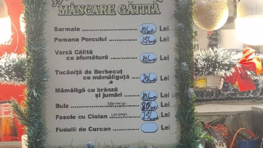 Cât costă o porție de „pomana porcului” la Târgul de Crăciun din Craiova / Prețurile comercianților în prag de sărbători