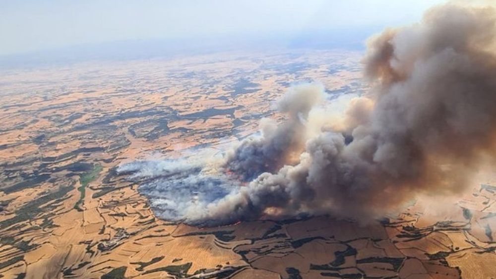 VIDEO | Peste 1.800 de hectare mistuite de flăcări, în urma incendiilor din provincia spaniolă Lérida / Doi fermieri au murit, iar 18.000 de persoane au fost evacuate 