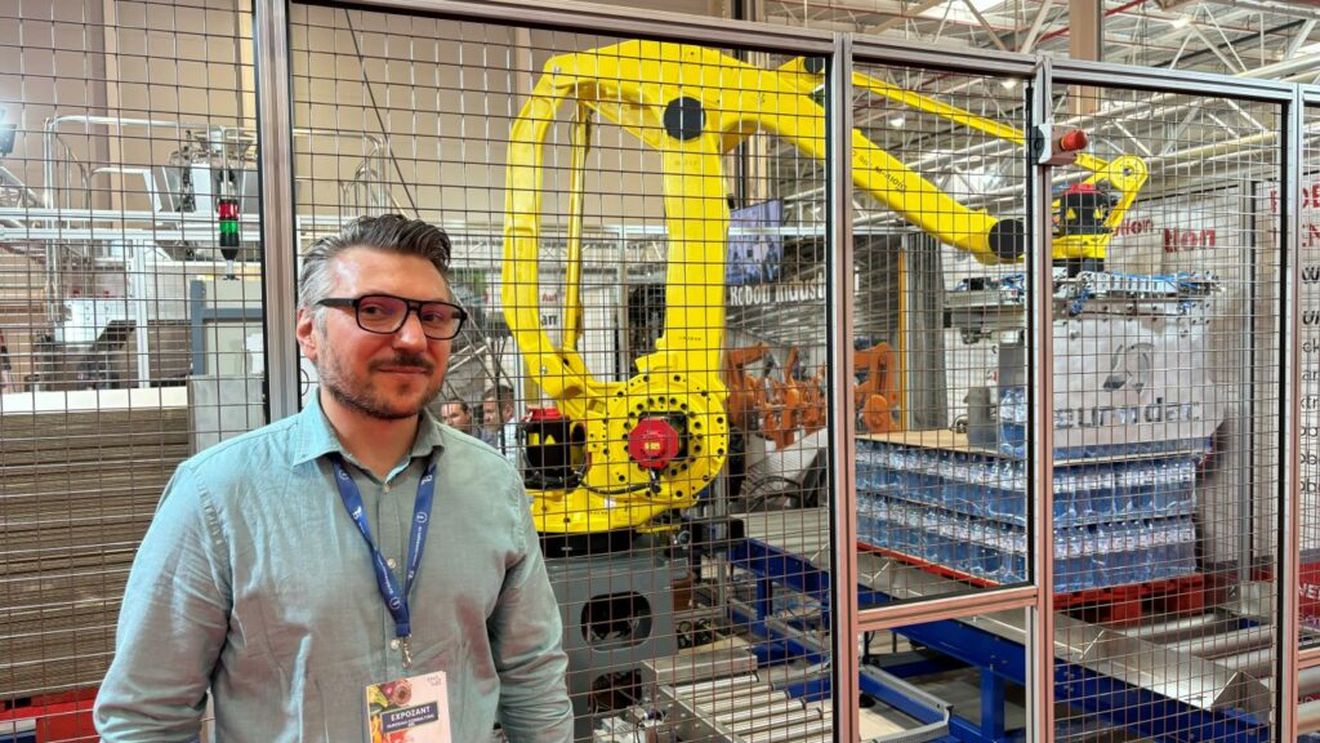 Fanuc, robotul japonez programat de un inginer român să ridice baxuri de apă minerală/ ”E o concepție greșită la noi că robotul ia jobul omului. De fapt, robotul realizează un efort pe care muncitorii umani nu-l pot face” - Cătălin Bodeanu, inginer proiectant