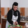 VIDEO | Dovlecei pe pat de morcov și ceapă, la cuptor. Rețeta maicii Irina de la Lacu Sărat: „Usturoiul îl dăm pe răzătoare, ca să-și lase zeama”